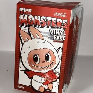 monsters Coca Cola Red and White Vinyl Face Toy